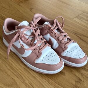 Nike Pink and White Sneakers Low-Top Design